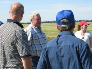 Berry Bortz, center, explains his cowherd genetics and genetic selection to a group of attentive listeners at an MBA program. Berry is a "giver"!