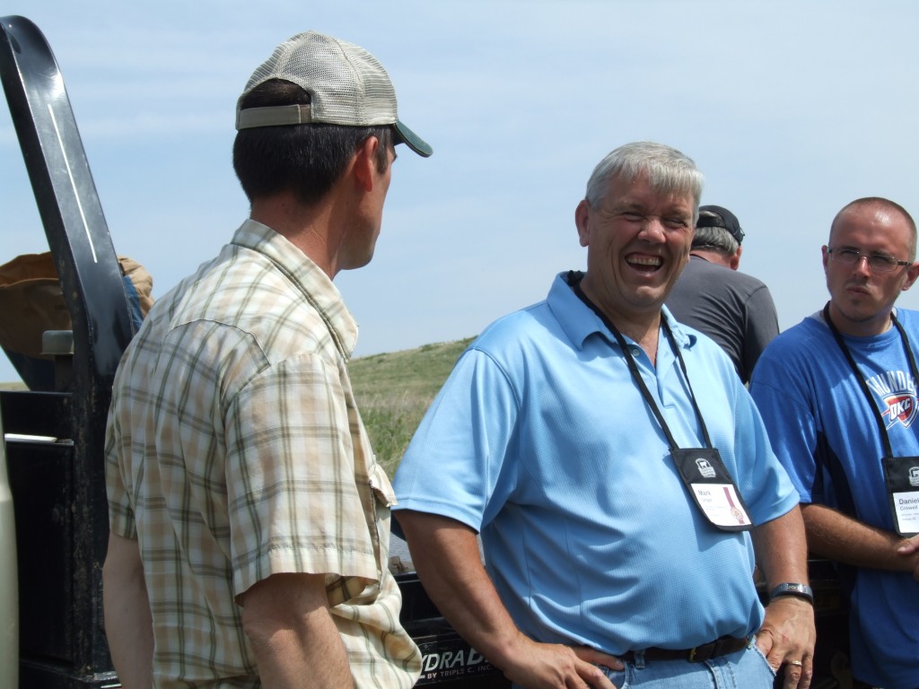 Unger and other MBA participants enjoy Debler's humor as he explains life as a commercial Angus producer. 