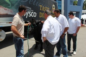 Executive Chef of Joe's Stone Crab, André Bienvenu, and colleagues visit with Roy Petteway, Petteway Citrus & Cattle, to discuss Florida ranching. 