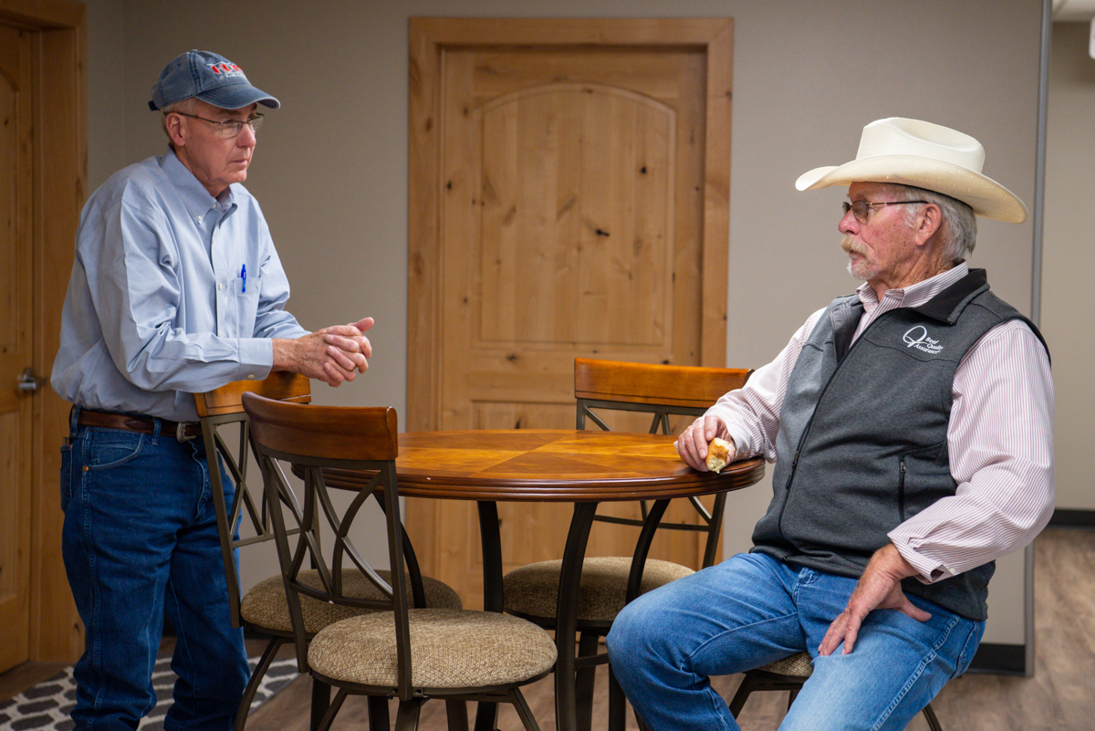 Bob Smith talks with Tom Jones of Hy-Plains Feedyard