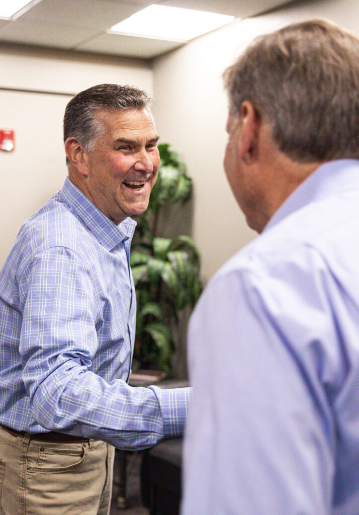 Steve Hunt shaking hands with Stan Linville