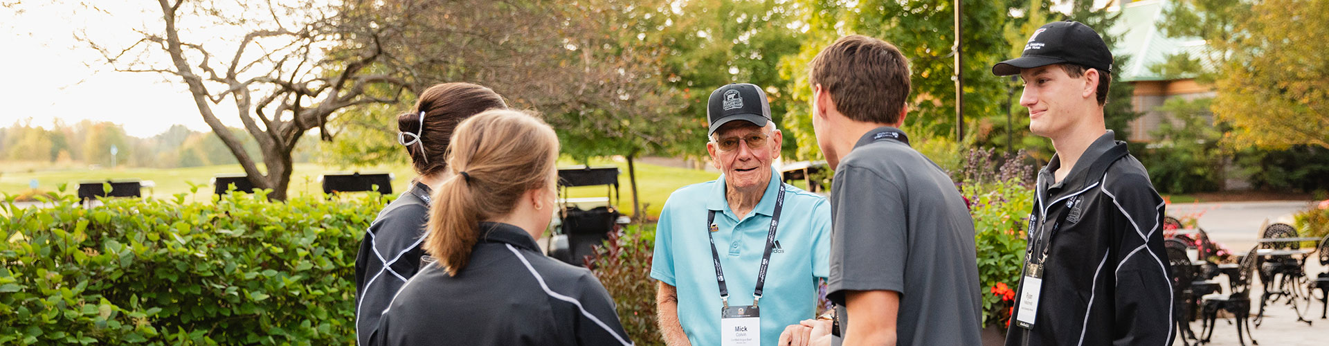 24-16614_AC24_Golf_MLB_7506-header Mick Colvin shaking hands with scholarship winners
