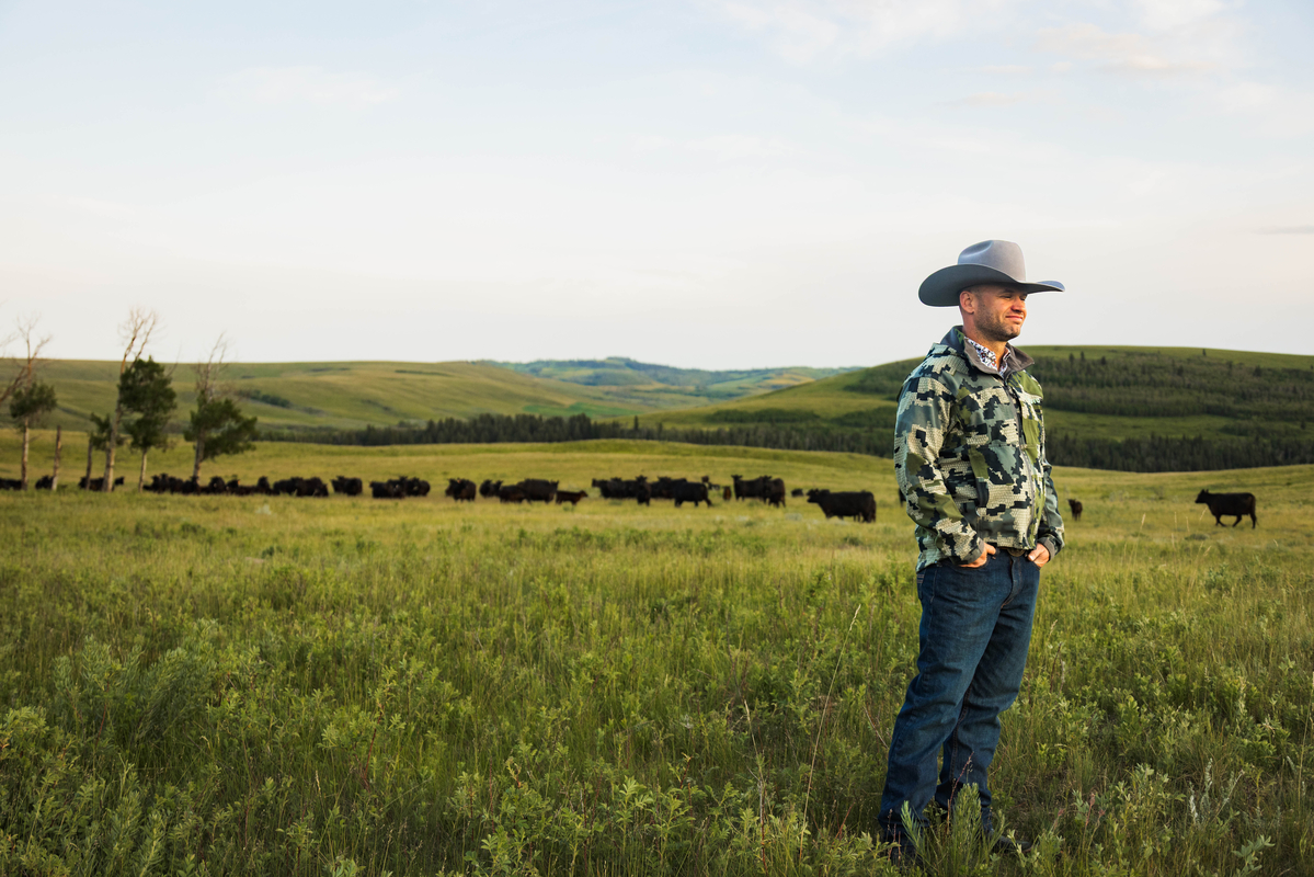 Canadian Angus rancher in a pasture